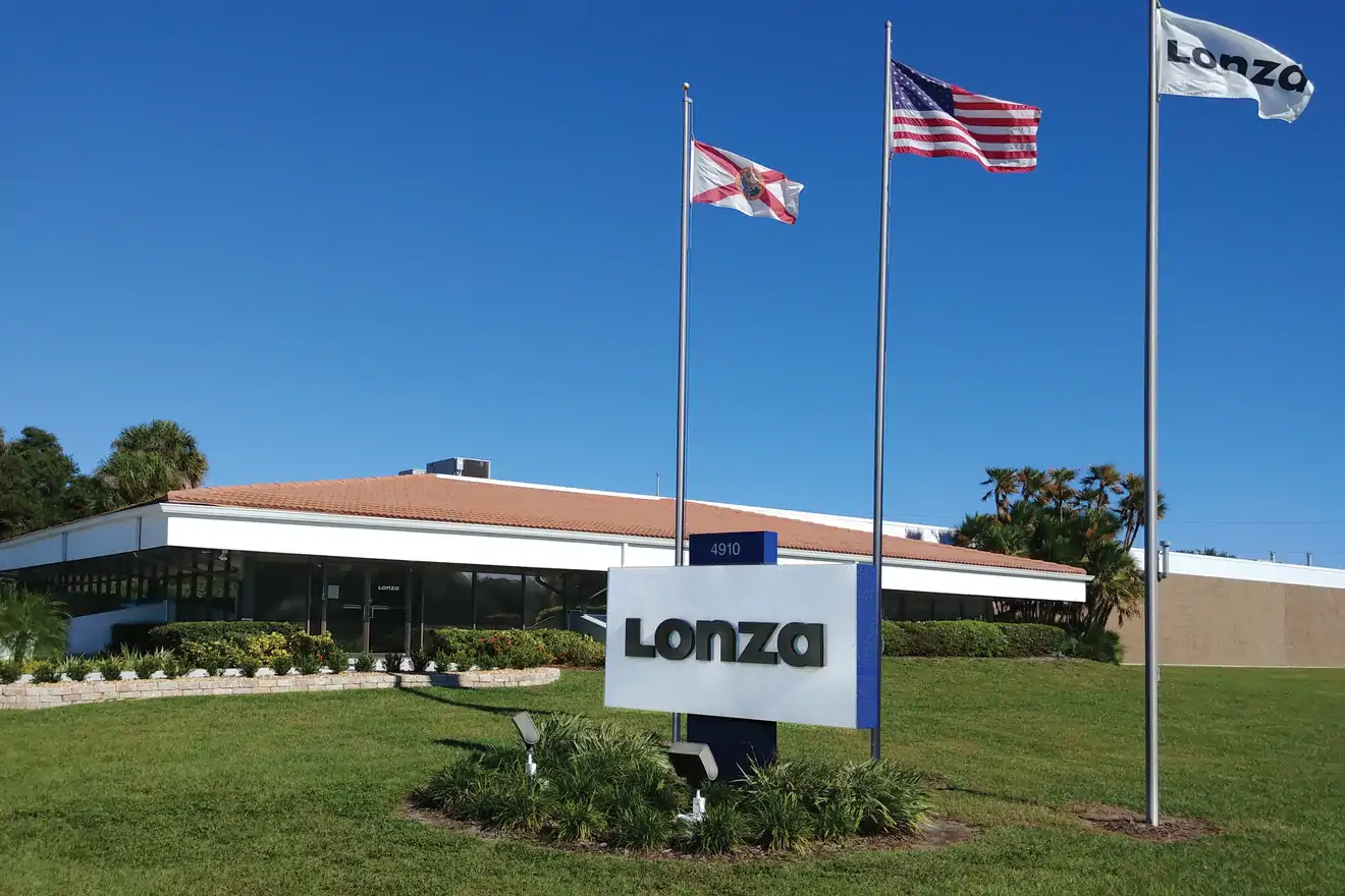 front of Tampa building with flags