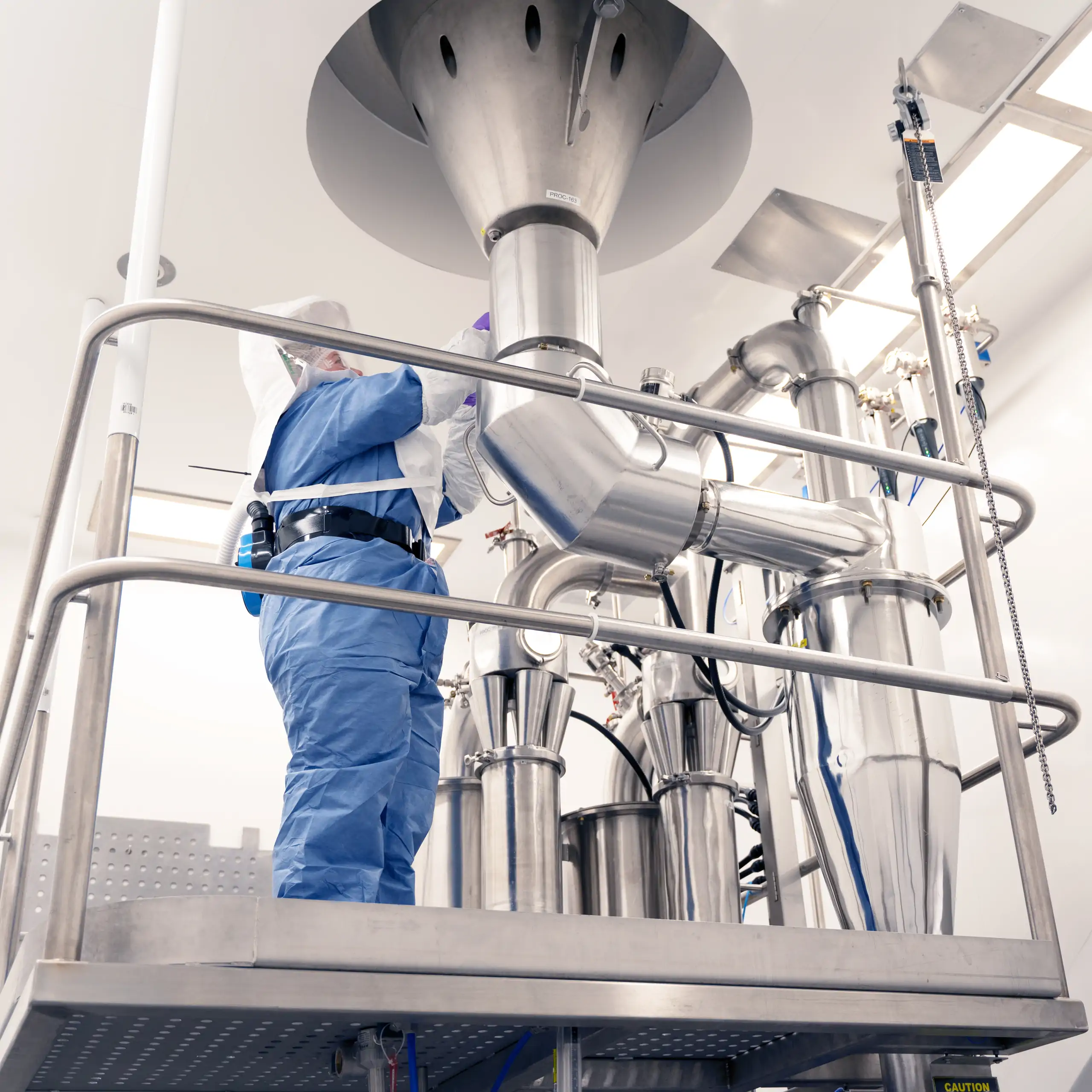 woman working on equipment in the lab