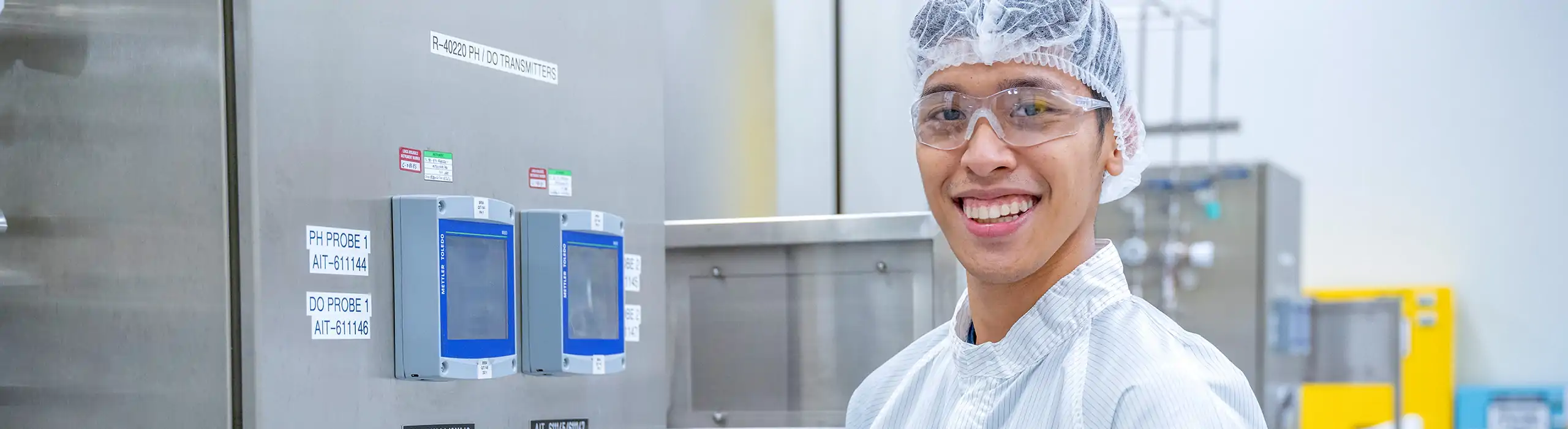 male technician smiling while working